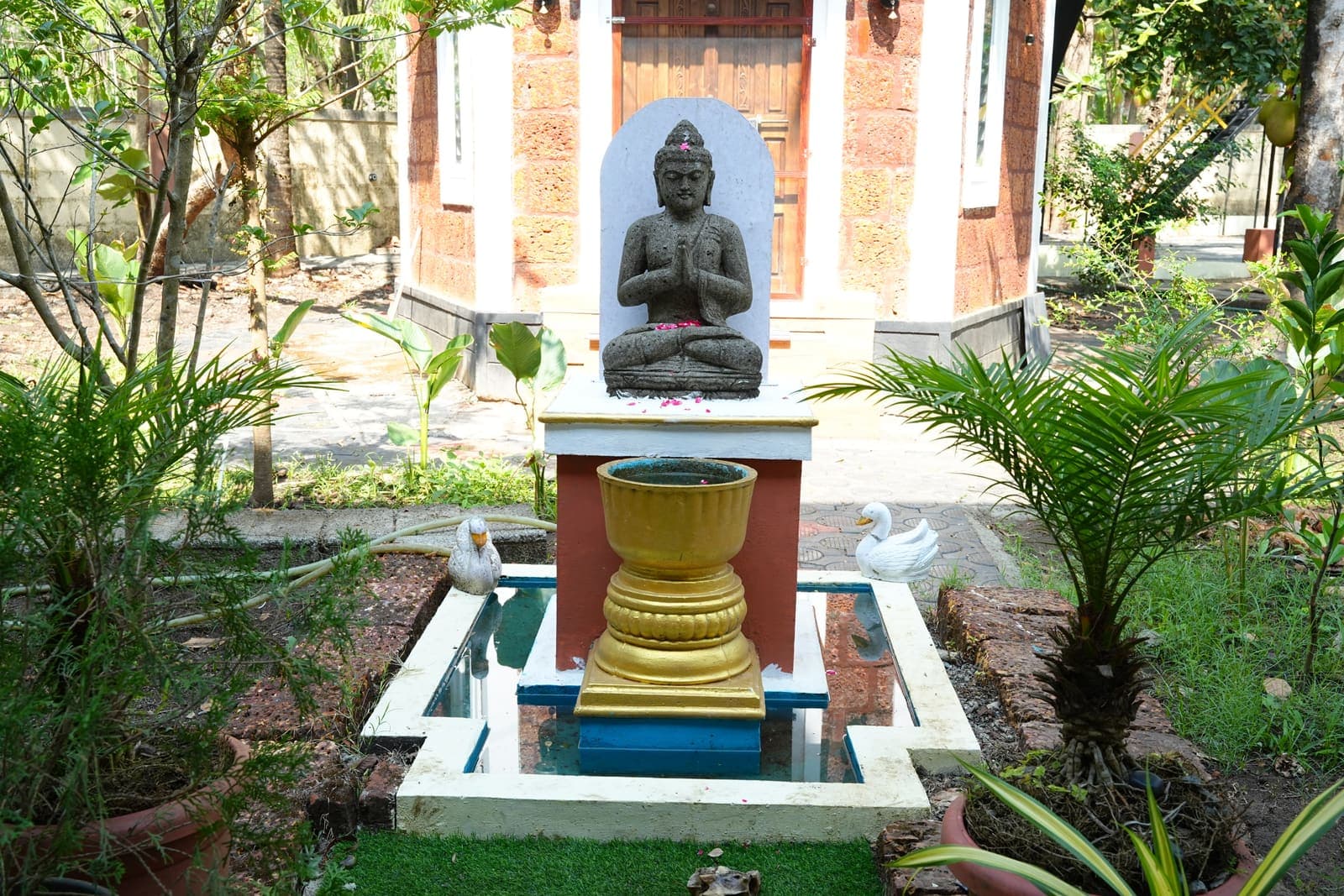 Buddha Courtyard — Kaivalyam Homestay, Padichira, Wayanad