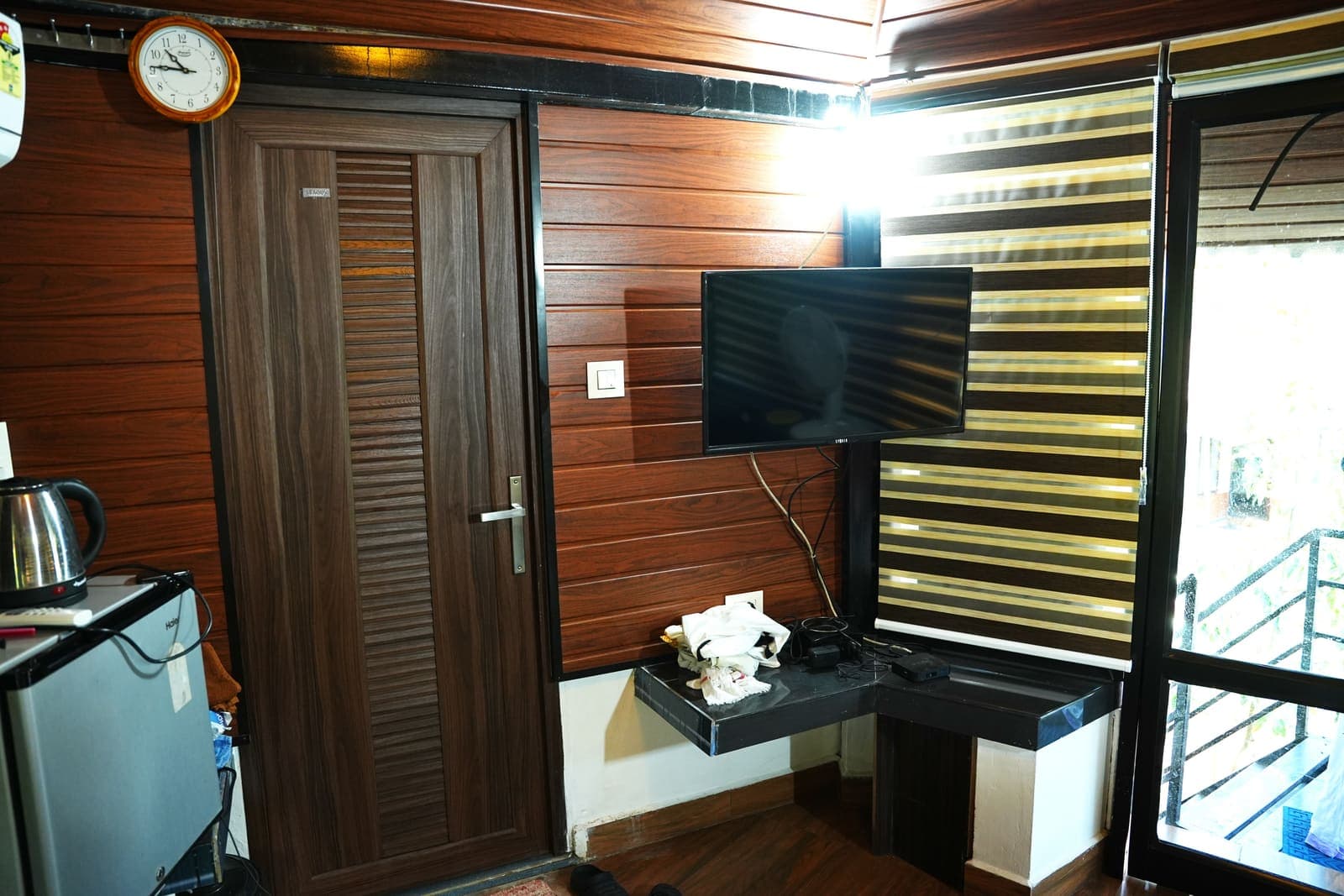 Room Tv Wood Panel — Kaivalyam Homestay, Padichira, Wayanad