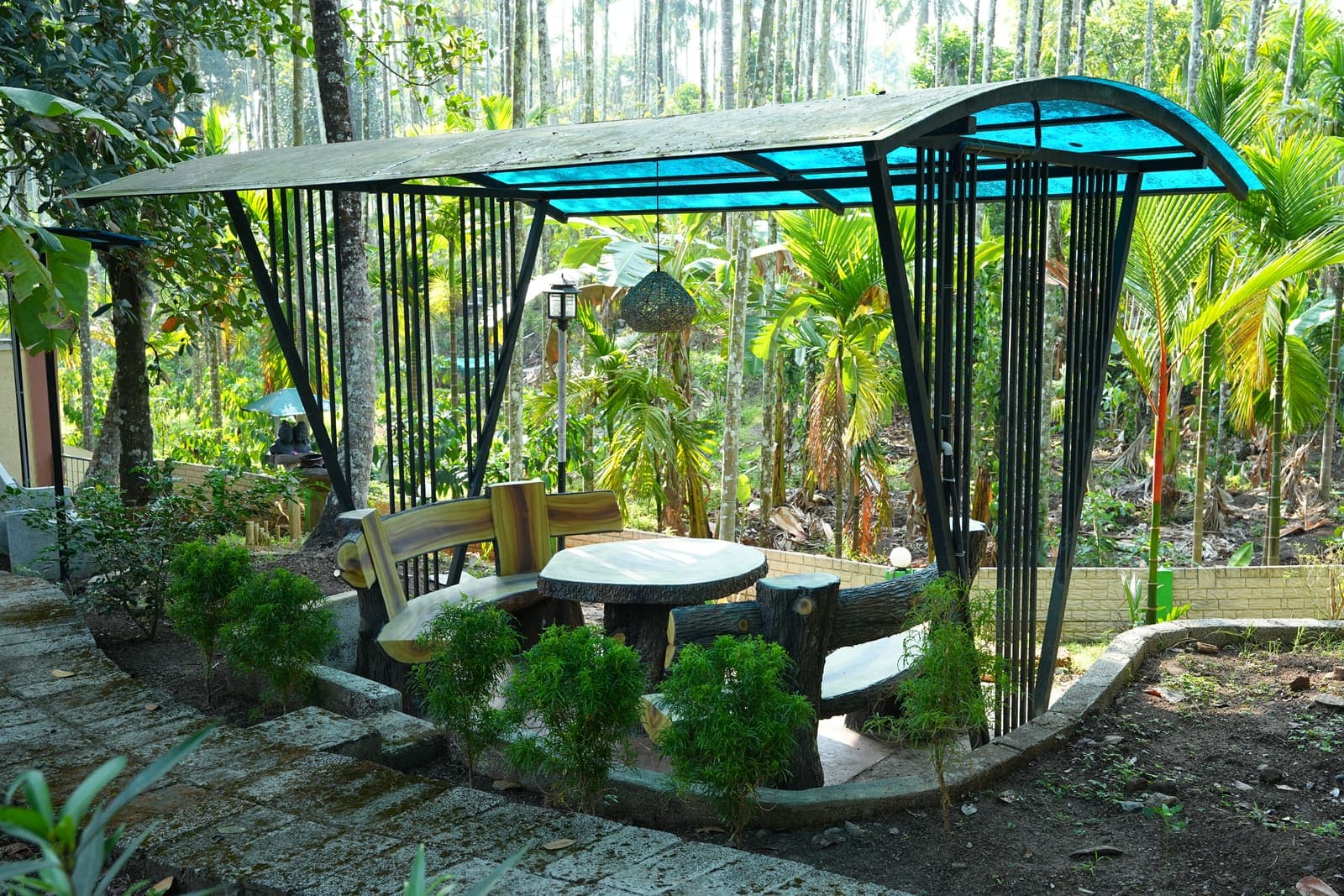 Covered Stone Seating — Kaivalyam Homestay, Padichira, Wayanad