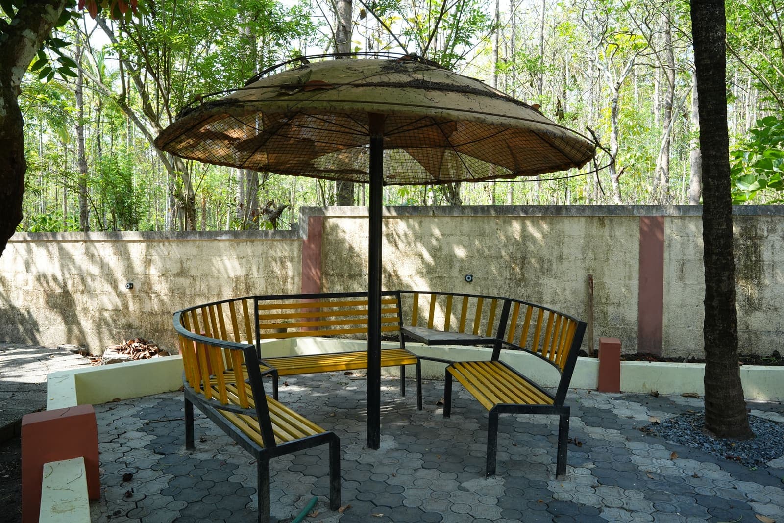 Umbrella Dining Table — Kaivalyam Homestay, Padichira, Wayanad